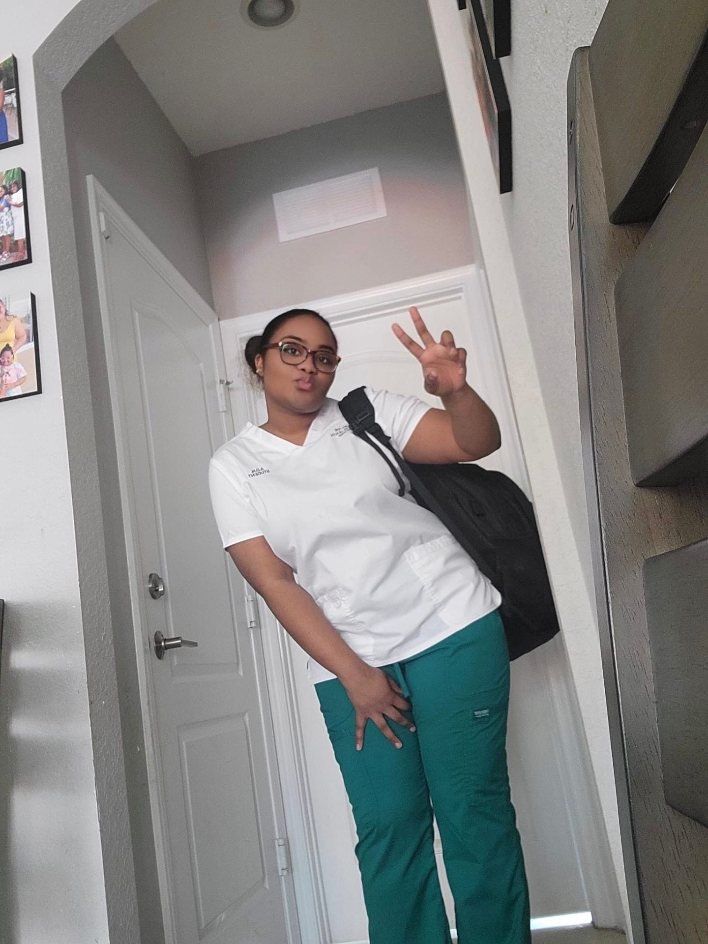 Gloria as an ADN nursing student in scrubs
